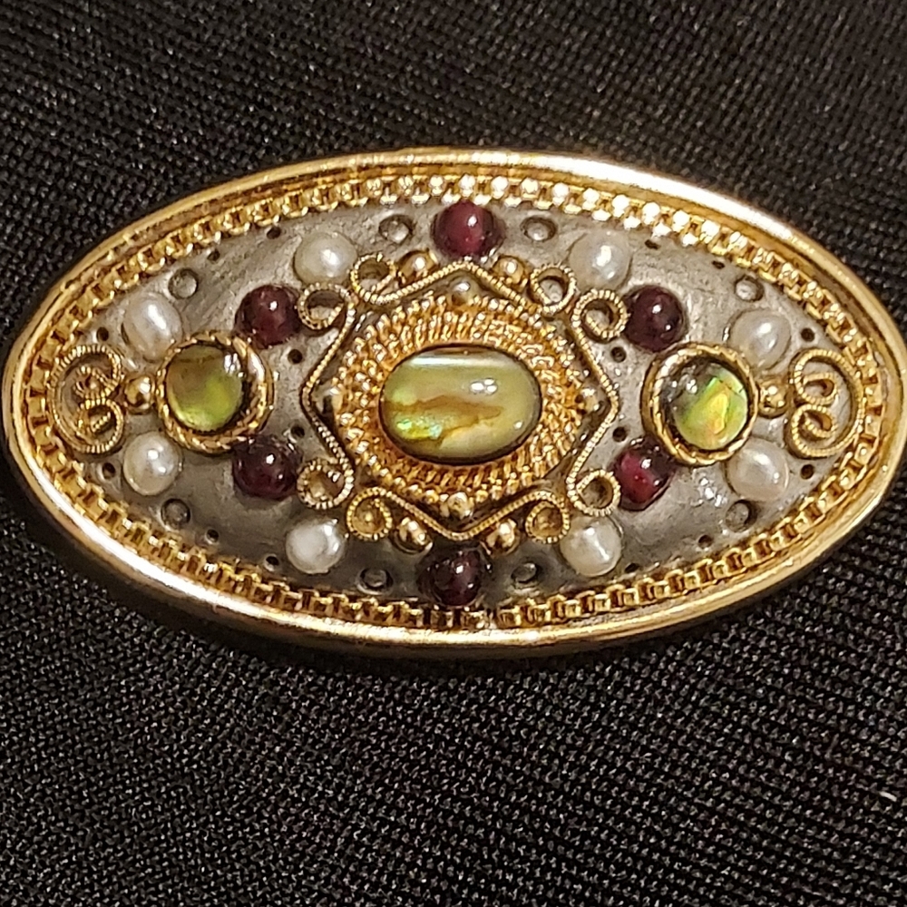 Vintage-Inspired Gold and Silver Brooch with Gem Details